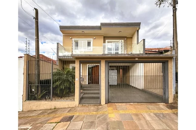 Imagem SJJMDF 115 Casa 610241038-13 - Casa à venda no bairro São José - Canoas/RS