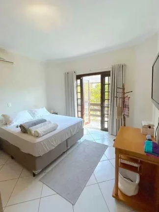 Imagem Casa com 3 dormitórios sendo1 suíte piscina e 2 vagas - Praia de Taquaras, Balneário Camboriú/SC