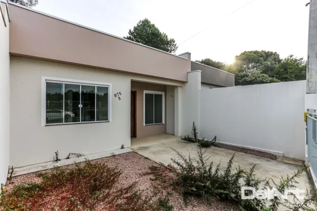 Imagem Casa térrea (geminada) - R$ 259.000,00 - Novinha - 61,02m2 - Bairro Bom Jesus/Rio Negro-Pr.