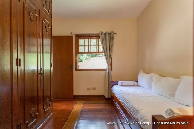 Imagem Casa com 7 dorms (5 suítes) à venda, 500 m² por R$ 3.900.000 - Granja Viana - SP