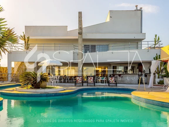 Imagem Belíssima mansão mobiliada com 10 suítes e vista para o mar à venda na Praia do Pernambuco no Guarujá