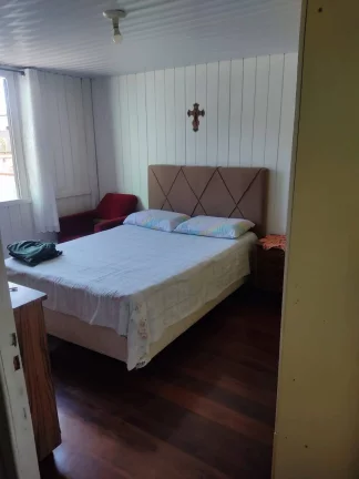 Imagem Terreno com uma casa mista no paranaguamirim