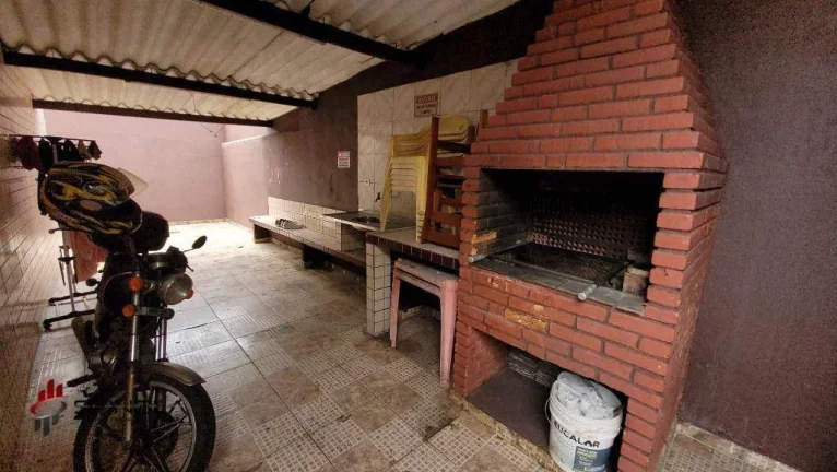 Imagem Apartamento com 2 dormitórios à venda, 65 m² por R$ 265.000,00 - Tupi - Praia Grande/SP