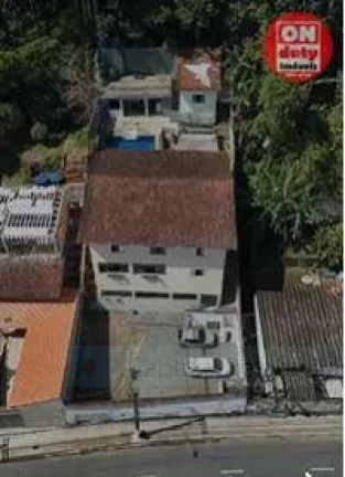 Imagem Casa com piscina e área de lazer com 6 dormitórios à venda, 736 m² por R$ 1.400.000 - Morro dos Barbosas - São Vicente/SP