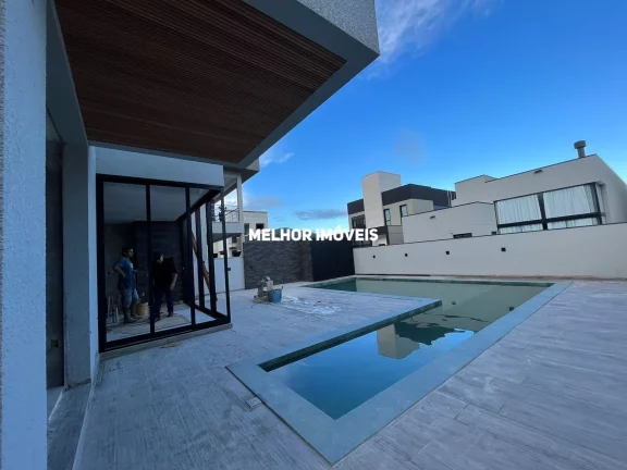 Imagem Casa nova Alto Padrão á venda com 3 suítes e 2 vagas localizada em Camboriú