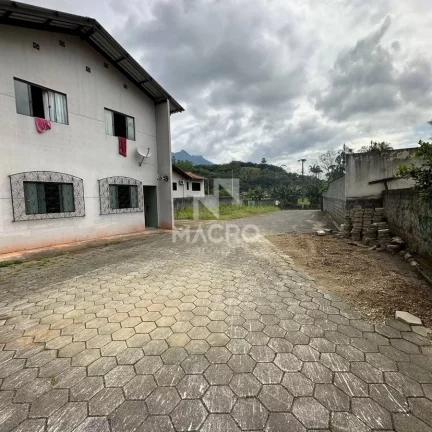 Imagem Terreno contendo 2 apartamentos | Guaramirim | Ilha da Figueira