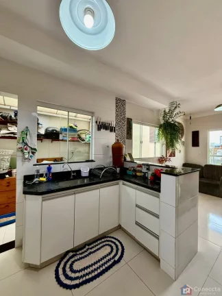 Imagem Apartamento à Venda no Bairro Laranjeiras – 2 Quartos com Planejados e Garagem