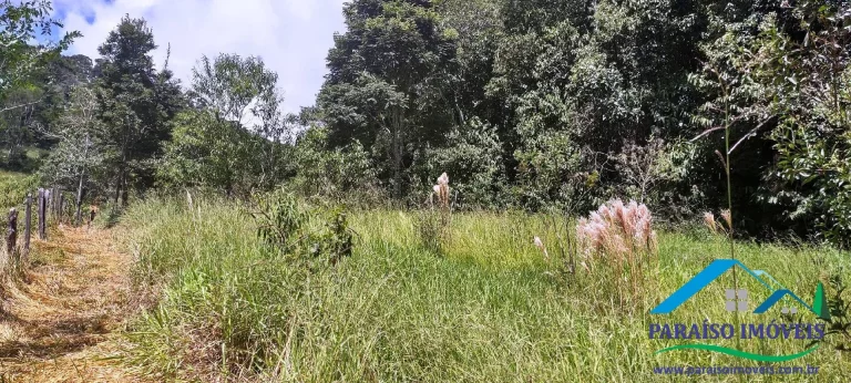 Imagem Paraíso Ecológico: Terreno com Nascente Própria e Vista para as Montanhas.