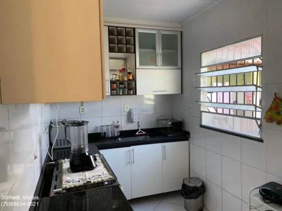 Imagem Casa na Aruana - Espaçosa, Posição Sul, 3 Vagas de Garagem!