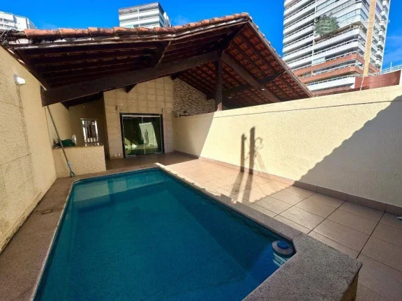Imagem Casa com 3 dormitórios à venda, 112 m² por R$ 750.000,00 - Guilhermina - Praia Grande/SP