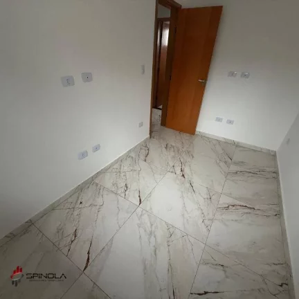 Imagem Sobrado com 2 dormitórios à venda, 54 m² por R$ 345.000 - Maracanã - Praia Grande/SP