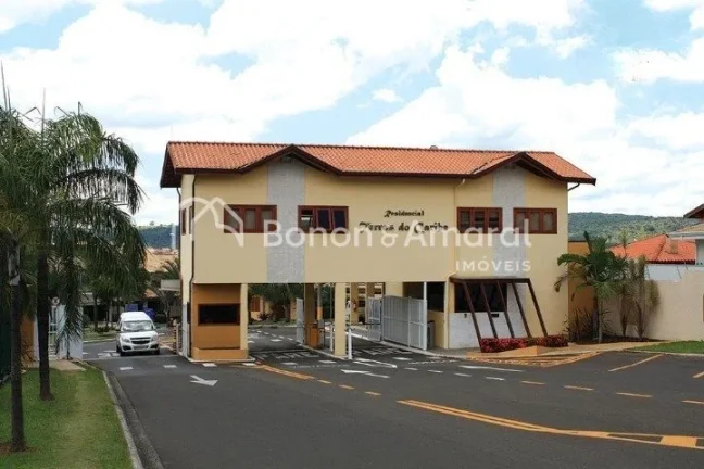 Imagem Esta elegante casa está situada no renomado Condomínio Residencial Terras do Caribe, em Valinhos, ...