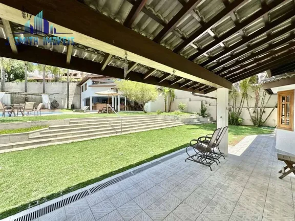 Imagem CASA 5 SUÍTES, SALÃO GOURMET, PISCINA, TERRENO 1.000m²,CONDOMÍNIO FECHADO