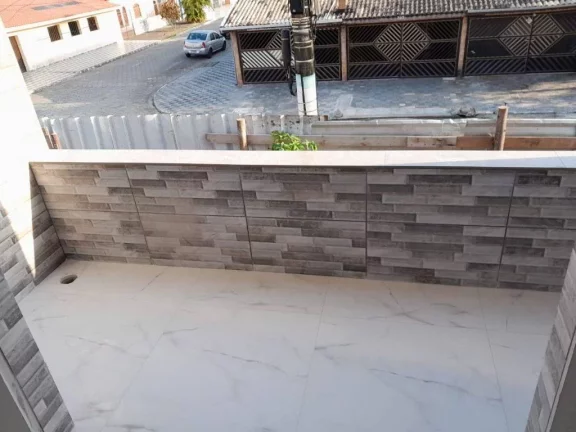 Imagem Casa com 2 dormitórios à venda, 65 m² por R$ 370.000,00 - Maracanã - Praia Grande/SP