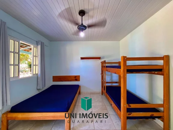 Imagem Chácara com 10 suítes e Cachoeira a venda, 9.104M² na zona rural de Guarapari.