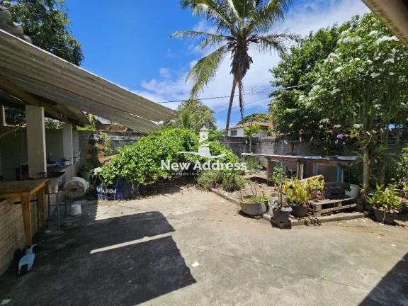 Imagem Casa 2 quartos à venda em Enseada de Jacaraípe, murada e gradeada, ideal para quem busca praticidade e quintal.