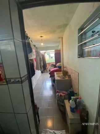 Imagem Terreno com 3 Casas com 3 vagas de carro e moto.