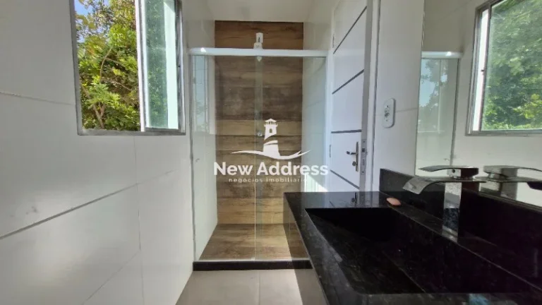 Imagem Casa triplex com vista privilegiada de Vila Velha, sala ampla, suíte com closet e garagem para até 3 carros. Imóvel espaçoso e bem distribuído.