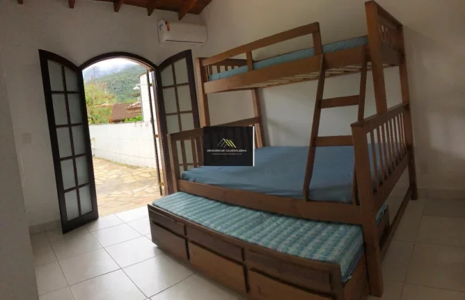 Imagem Casa em Condomínio para Venda em Ubatuba / SP no bairro Horto Florestal