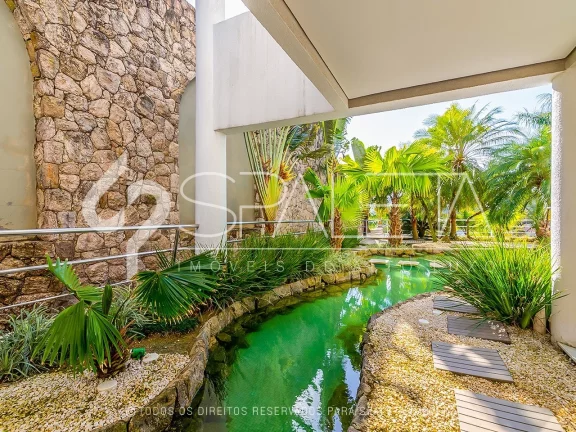 Imagem Belíssima mansão mobiliada com 10 suítes e vista para o mar à venda na Praia do Pernambuco no Guarujá