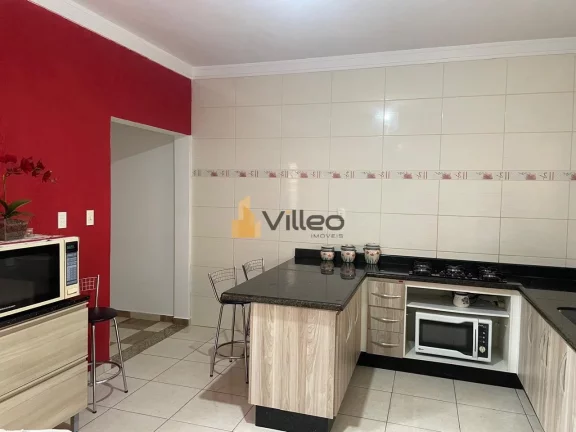 Imagem Descubra uma rara oportunidade de viver com elegância e praticidade em um sobrado moderno e bem dis...