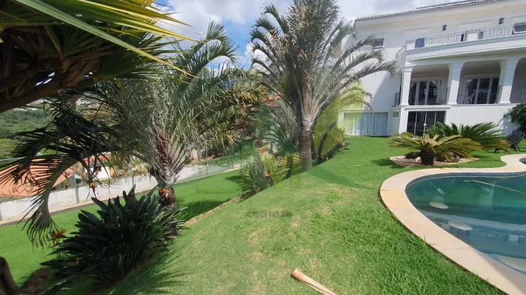 Imagem Mansão de Luxo no Condomínio Flamboyant: Exclusividade e Sofisticação em At