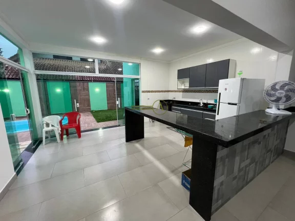 Imagem Casa novíssima térrea, 100 metros da praia, piscina e lavabo