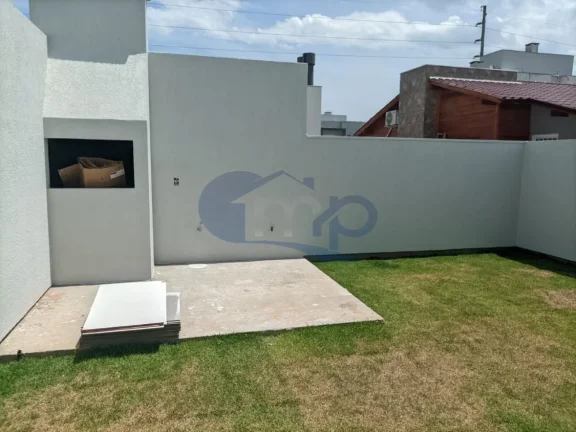 Imagem Casa geminada com 3 dormitórios no Loteamento Morada das Palmeiras em Torres/RS