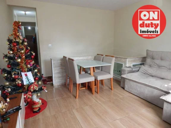 Imagem Casa com 2 dormitórios à venda, 73 m² por R$ 320.000,00 - Areia Branca - Santos/SP
