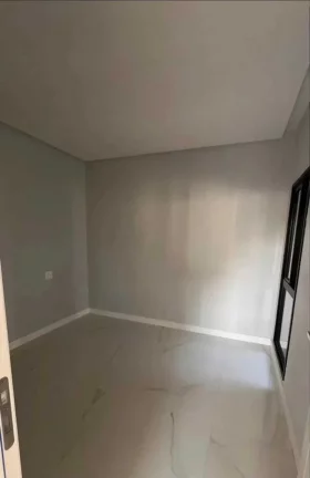 Imagem Sobrado alto padrão com 4 suítes e 2 vagas de garagem em Camboriú/SC