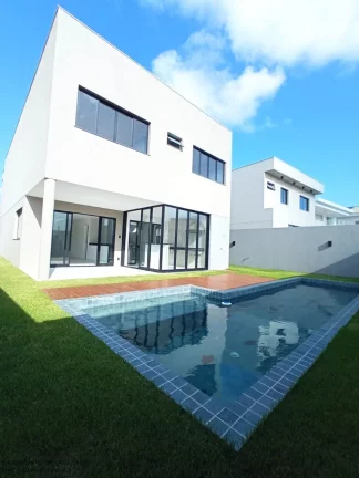 Imagem Imperdível: Casa de luxo em condomínio Alphaville, 4 quartos, 4 suítes, 2 salas, 4 vagas em Camaçari-BA