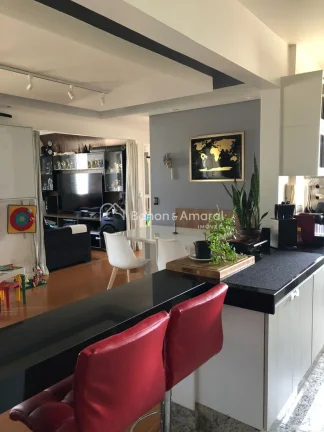 Imagem Apartamento de 75 m² em andar alto, com três quartos sendo uma suíte, sala para dois ambientes e ...
