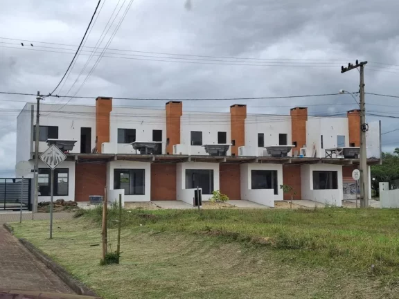 Imagem Sobrado com 2 quartos, 125m², à venda em Passo de Torres