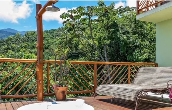 Imagem Venha desfrutar de uma estadia inesquecível em nossa luxuosa casa, localizada em um exclusivo condomínio fechado de alto padrão, próximo à deslumbrant