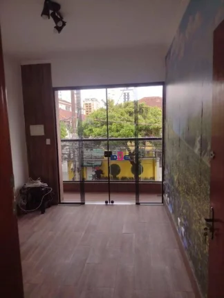 Imagem Casa com 3 dormitórios à venda, 240 m² por R$ 1.750.000,00 - Gonzaga - Santos/SP