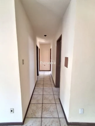 Apartamento Espaçoso: 3 Dormitórios e Suíte em Bairro Central