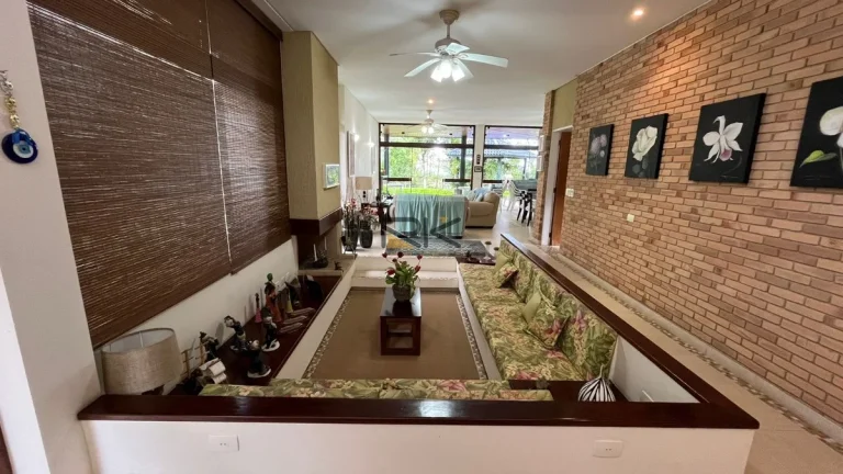 Imagem CASA EM CONDOMINIO FECHADO COM 4 SUÍTES,5 VAGAS DE GARAGEM,VARANDA GOURMET COM CHURRASQUEIRA,SALA COM 2 AMBIENTES E SALA DE ESTAR.