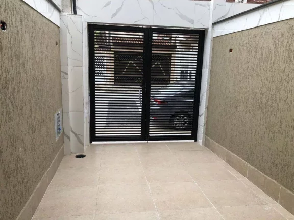 Imagem Sobrado com 2 dormitórios à venda, 60 m² por R$ 390.000,00 - Caiçara - Praia Grande/SP