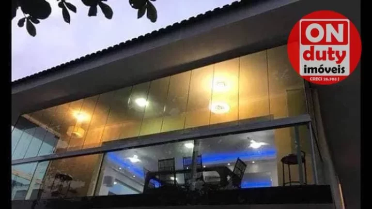 Imagem Belissímo Sobrado com 3 dormitórios à venda, 500 m² por R$ 2.850.000 - Jardim Virginia - Guarujá/SP