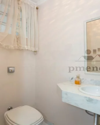 Imagem Apartamento com piso de madeira, living para 2 ambientes, 2 dormitórios sendo 1 suíte, lavabo, coz...
