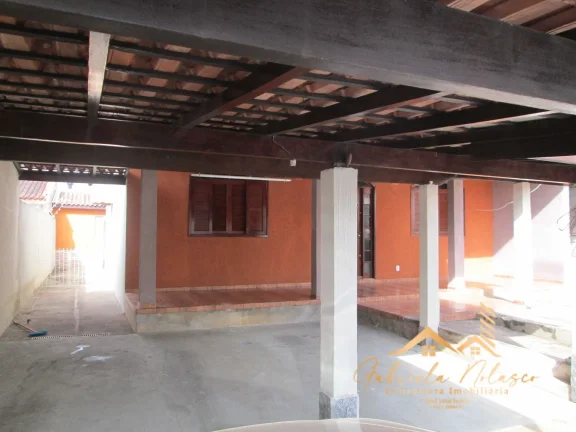 Imagem Casa Padrão com dois dormitórios mais edícula