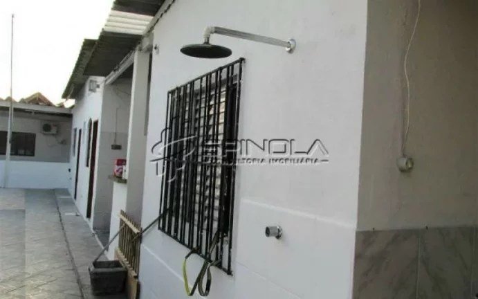 Imagem Casa com 3 dormitórios à venda, 190 m² por R$ 850.000 - Vila Tupi - Praia Grande/SP