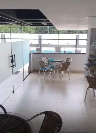 Imagem Apartamento a venda com 2 dormitórios e varanda gourmet no centro de Ubatuba.