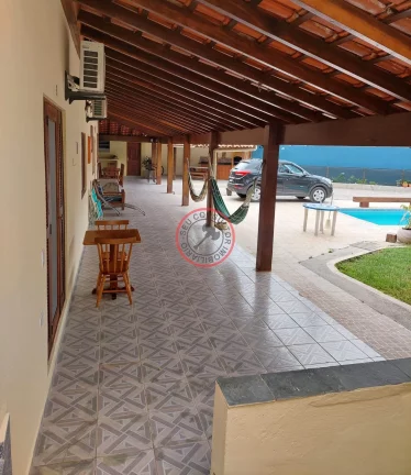 Imagem CASA Terrea escritura definitiva com varanda ,2 suites, lavabo, area gourmet,piscina , garagem para 5 carros e duas kitnets