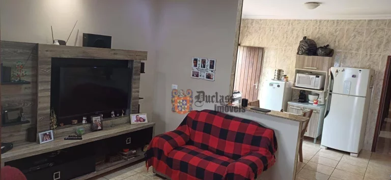 Imagem Casa com 3 dormitórios à venda, 114 m² por R$ 495.000,00 - Maracanã - Praia Grande/SP