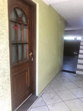 Imagem Sobrado à Venda em Santo Andr?(C) com 2 dormitórios , sala, cozinha, banheiro e lavanderia,com garagem coberta para dois carros. Fundos com quintal gran