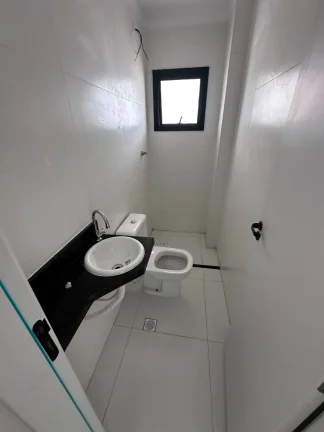 Imagem Imperdível oportunidade: Apartamento à venda em Praia Grande-SP, bairro Tupi, 2 quartos, 1 suíte, 2 salas, 1 vaga, 59m²!