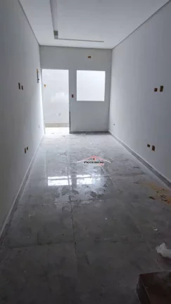 Imagem Casa com 2 dormitórios à venda, 60 m² por R$ 350.000 - Tude Bastos - Praia Grande/SP