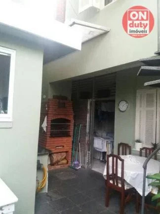 Imagem Sobrado com 5 dormitórios à venda, 290 m² por R$ 1.800.000,00 - Boqueirão - Santos/SP