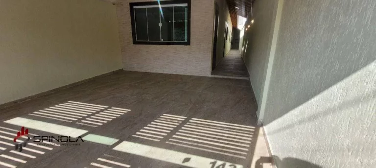Imagem Casa com 2 dormitórios à venda, 110 m² por R$ 585.000,00 - Maracanã - Praia Grande/SP